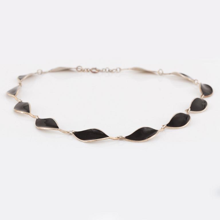 David Andersen, necklace and two brooches, silver and enamel.