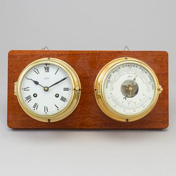 A second half of the 20th century brass  ships clock and baometer.