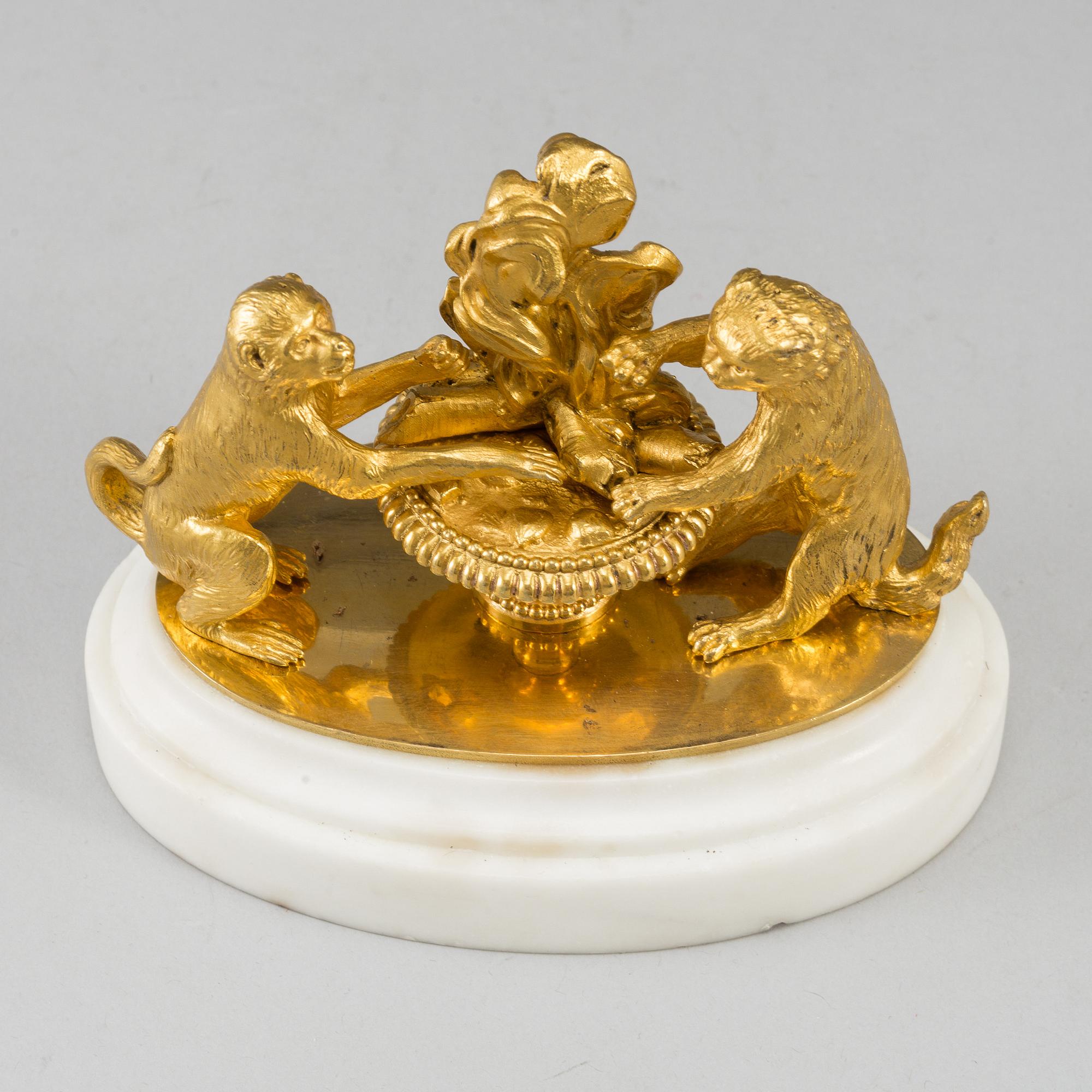 An ormolu and marble paperweight, France, first half of the 19th century.