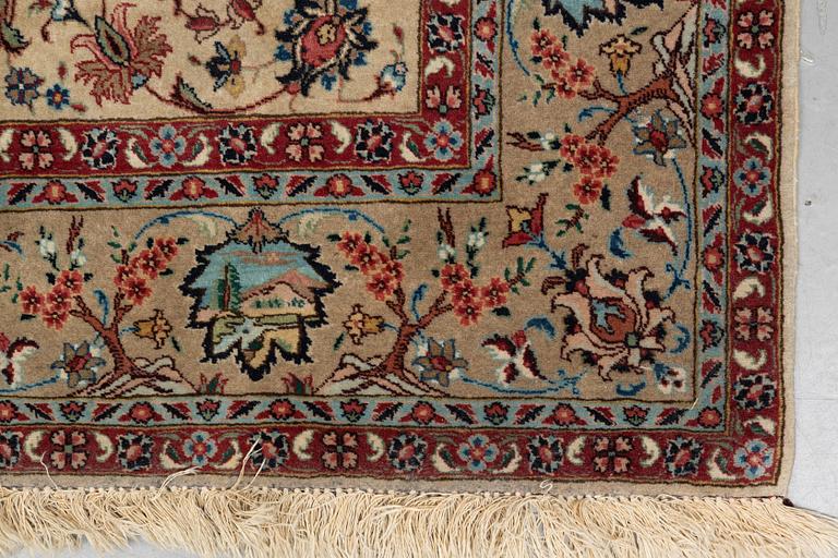 A carpet, semi-antique Tabriz, figural, signed, ca 234 x 170 cm.