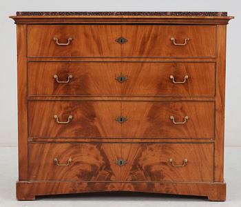 A Swedish Empire 19th century writing commode with porphyry top.