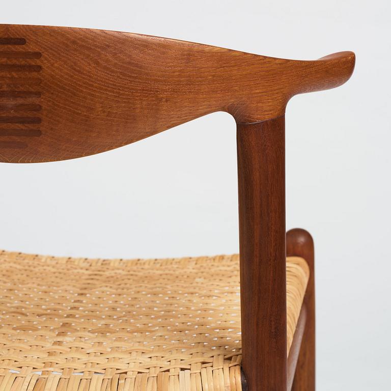 Hans J. Wegner, a teak, oak and cane "Cowhorn chair", JH 505, Johannes Hansen, Denmark 1950-60's.