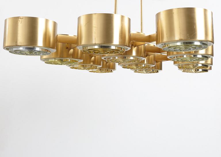 Hans-Agne Jakobsson, A Hans Agne Jakobsson twelve light brass chandelier, model T 363/12, Markaryd, Sweden 1960-70's.