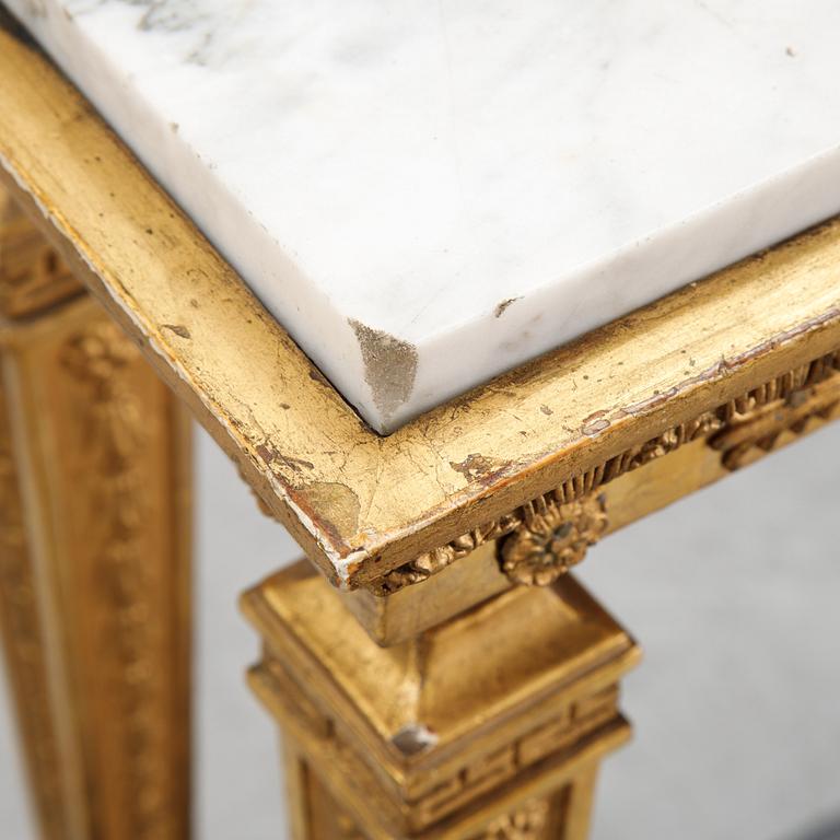 An early 19th Century console table.