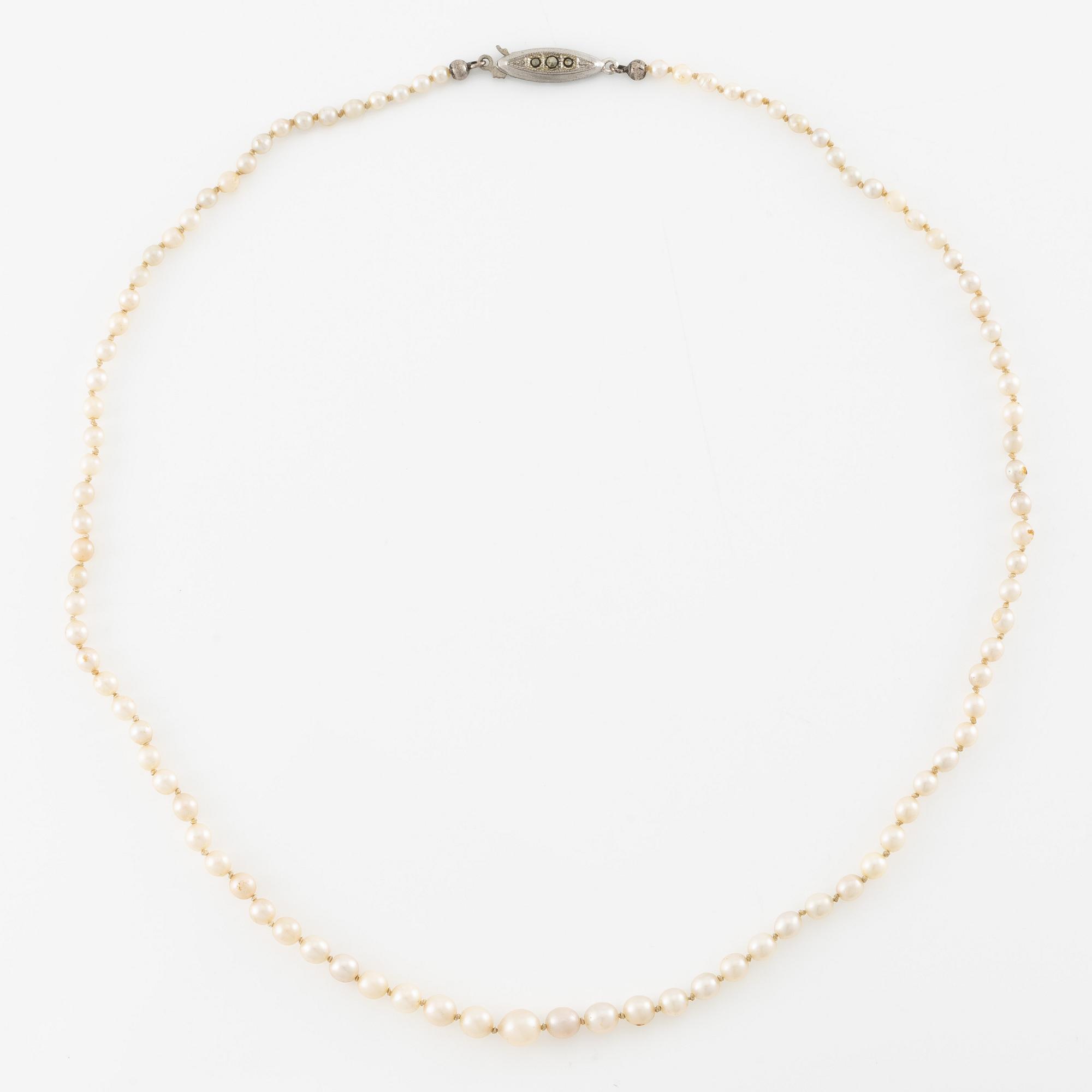 Pearl necklace, graduated pearls, clasp silver with pyrite.