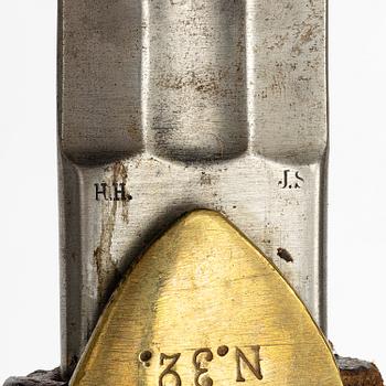 A Swedish artillery saber 1889 pattern with scabbard.