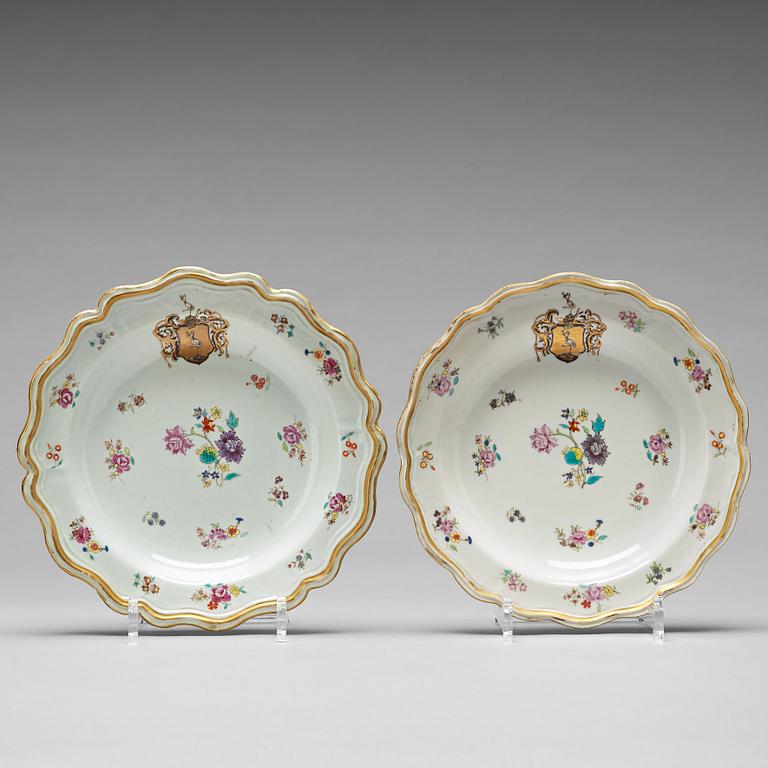 A pair of famille rose armorial soup dishes, Qing dynasty, Qianlong (1736-95).