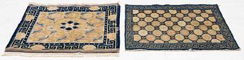 Two antique Ningxia meditation rugs, Qing dynasty, 19th century. c. 67 x 72 and 71 x 73 cm.