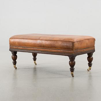 A CHESTERFIELD STYLE OTTOMAN, around year 2000.