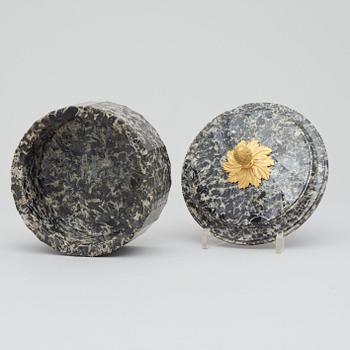 A Swedish Empire 19th century aglomerat stone butter box.