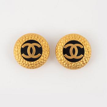 Chanel, a pair of gold tone clip-on earrings, 1990-1992.