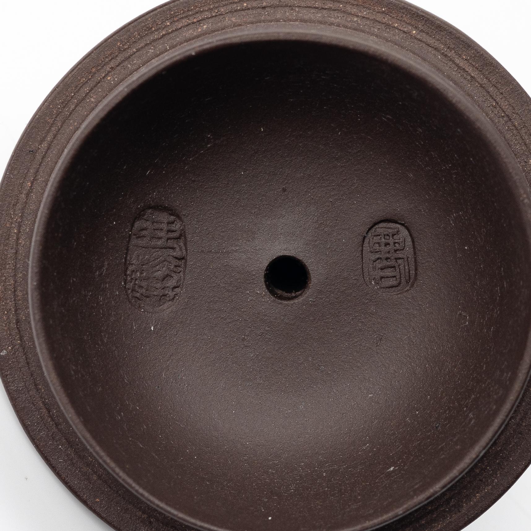 A group of three Chinese yixing teapots, 1980s.