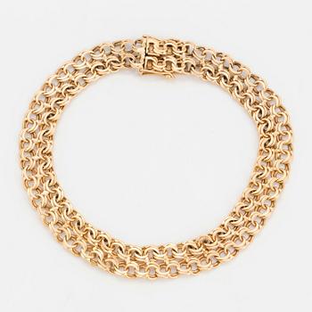 ARMBAND 18K guld.