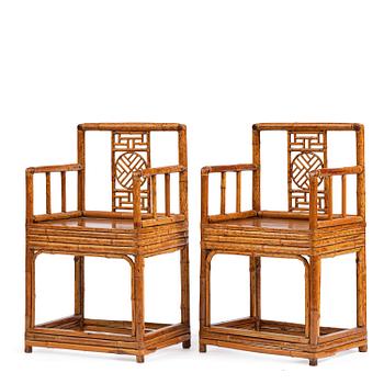 1008. A pair of spotted bamboo arm-chairs, Qing dynasty, 19th century.
