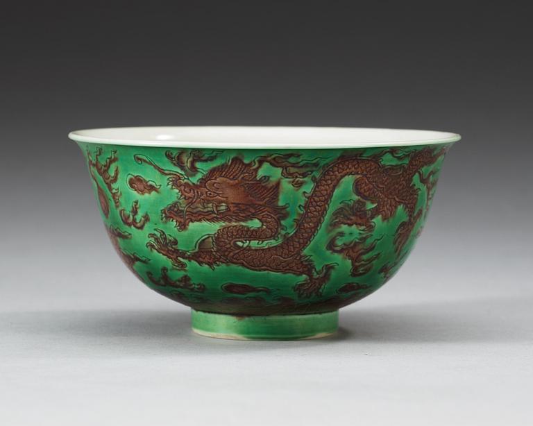 A green and aubergine glazed dragon bowl, Qing dynasty, with Kangxis six character mark and period (1662-1722).