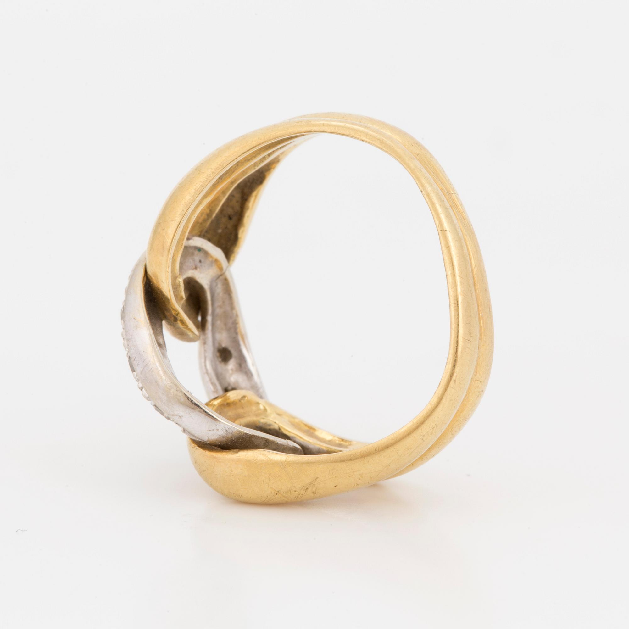 RING, with eight cut diamonds.