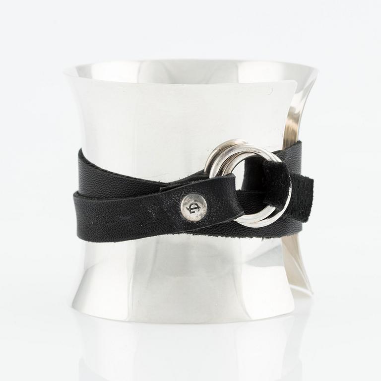 Georg Jensen, a bangle, sterling silver with leather strap, Denmark.