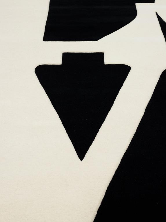 Robert Indiana, A CARPET, "White on Black", Chosen Love, hand tufted in 1995, ca 302 x 305 cm, Robert Indiana.