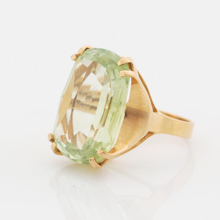 Synthetic green spinel cocktail ring.