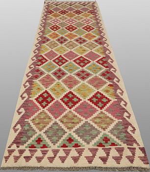 A Kilim runner, approx. 299 x 88 cm.