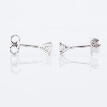 A pair of ca 0.80 cts brilliant cut diamond earrings.