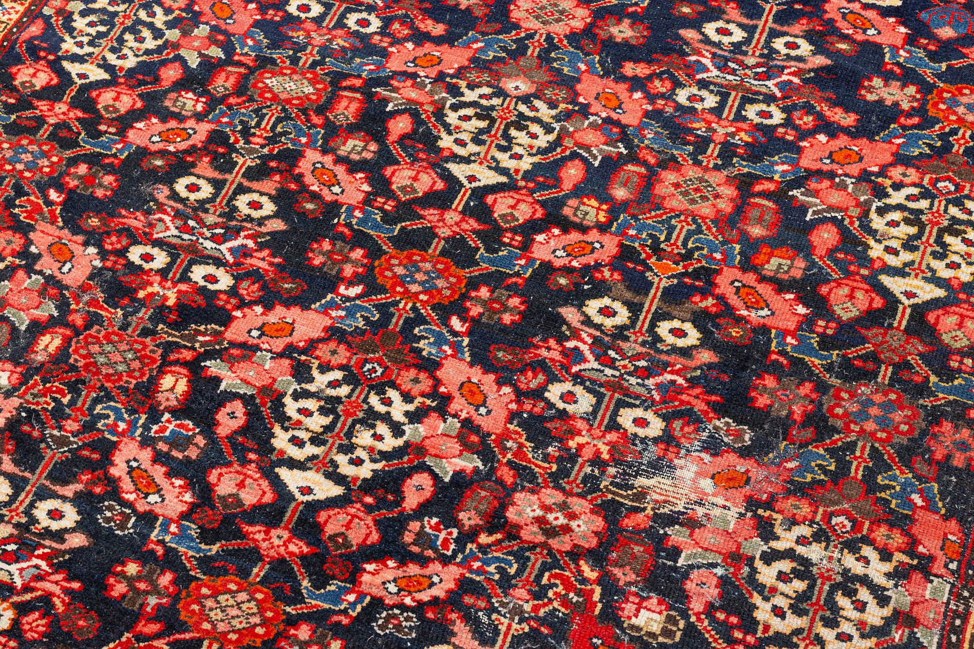 A Farahan carpet, c. 520 x 205 cm.
