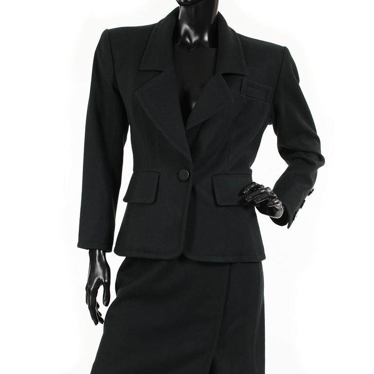 YVES SAINT LAURENT, a two-piece suit consisting of jacket and skirt.