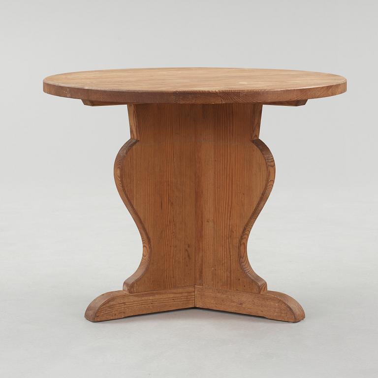 A stained pine table attributed to Axel Einar Hjorth, Nordiska Kompaniet, Sweden 1930's.