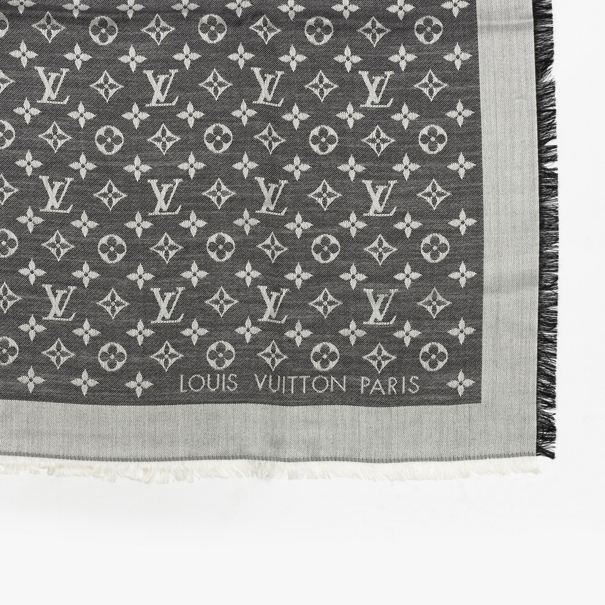 Louis Vuitton, a monogram silk and wool mix shawl.