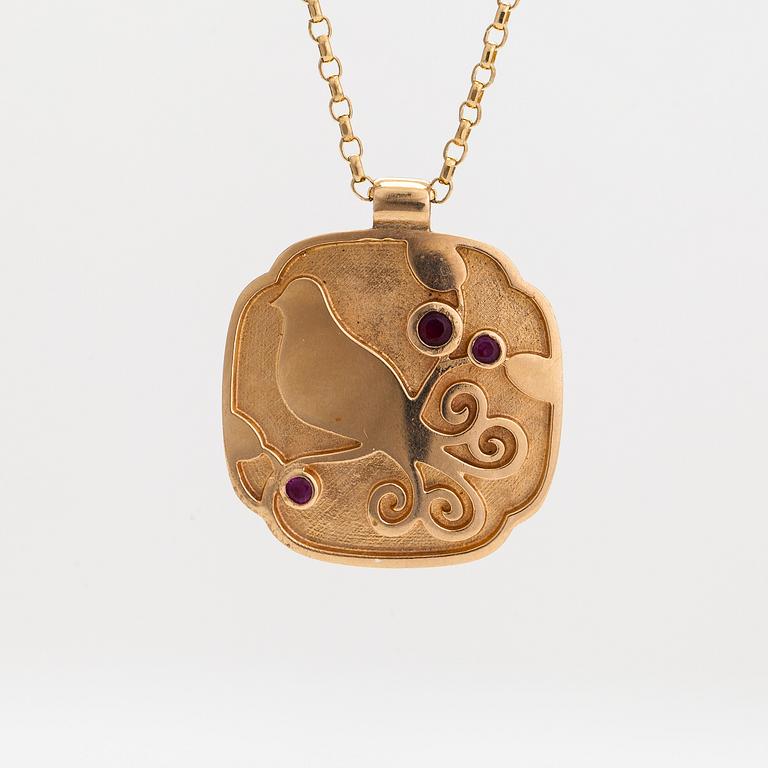 Halsband/hänge, 18K guld och rubiner.  Kedjan stämplad Unoaerre, Italien.