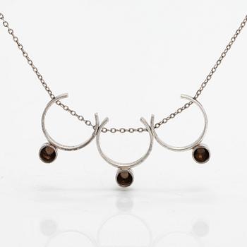 Elis Kauppi, A silver and smoky quartz necklace. Kupittaan kulta, Turku 1961.