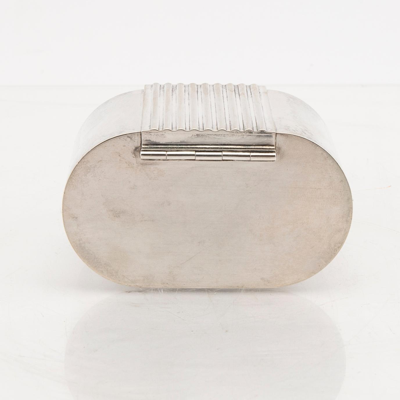 A Swedish 20th century  sterling silver box mark of Lars Håkansson Uppsala 1988, weight 196 grams book included.