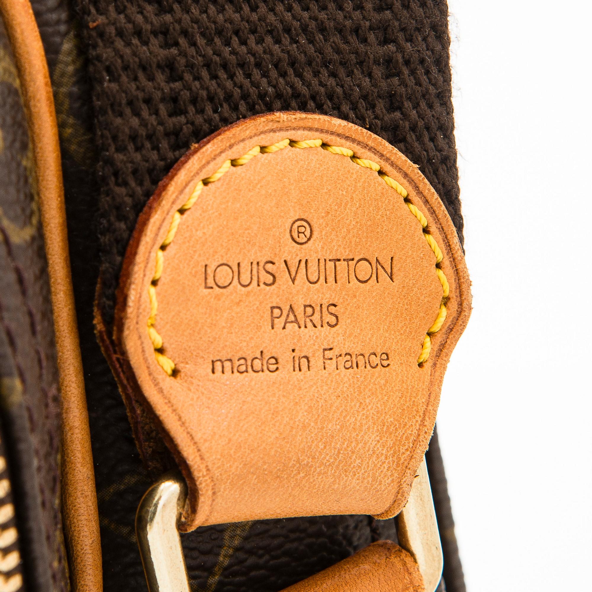 Louis Vuitton, a Monogram Canvas 'Reporter GM' bag.