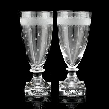 28 early 19th century champagne glasses.
