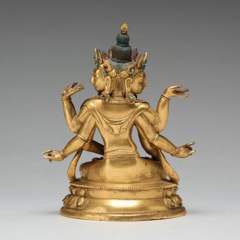 A Sino-Tibetan gilt copper alloy figure of Ushnisha Vinaya, late 18th century/circa 1800.