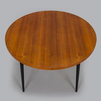 A mid-20th century dining table.