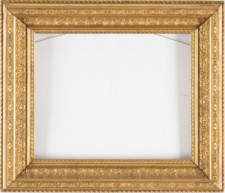 A bronzed Neo Renaissance frame, late 19th century, dated 1883 with pencil.