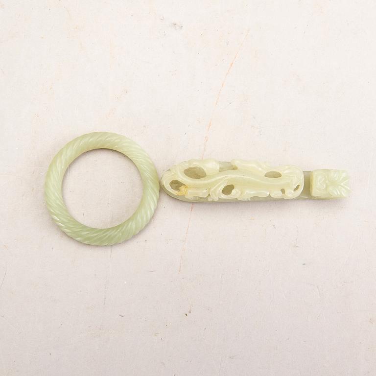 A Chinese nephrite belt hook and bangle, 20th Century.