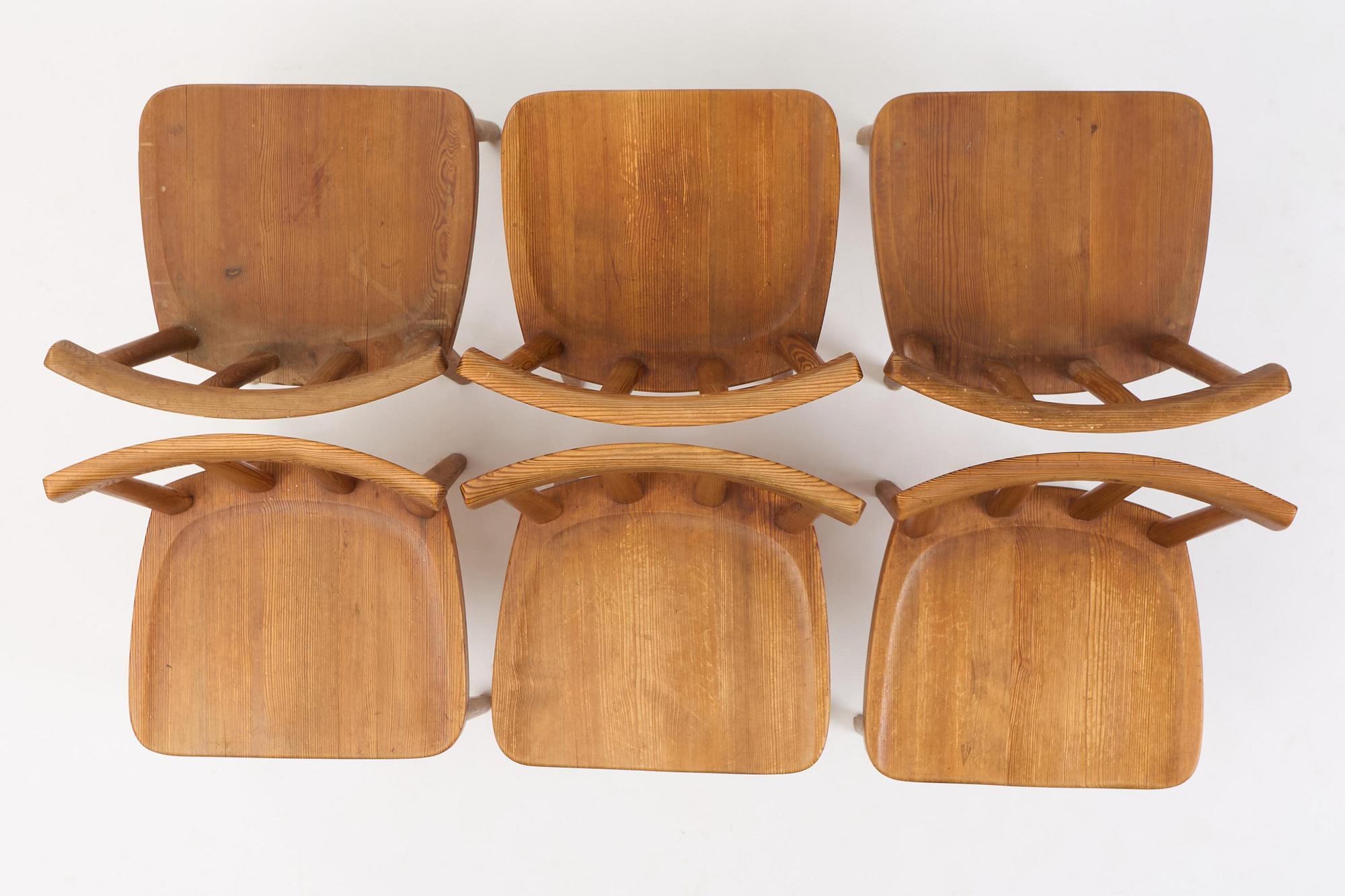 Axel Einar Hjorth, a set of six stained pine "Utö" chairs, Nordiska Kompaniet, Sweden, 1930s.