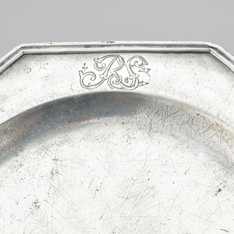 A set of six George II octagonal pewter plates by George Bacon of London mid 18th century.