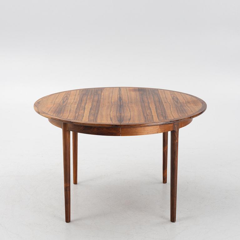 A Rosewood dining table and four chairs, Denmark. 1960-tal.