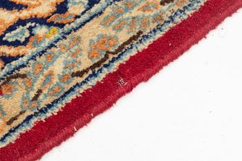 An oriental carpet, c. 290 x 198 cm.