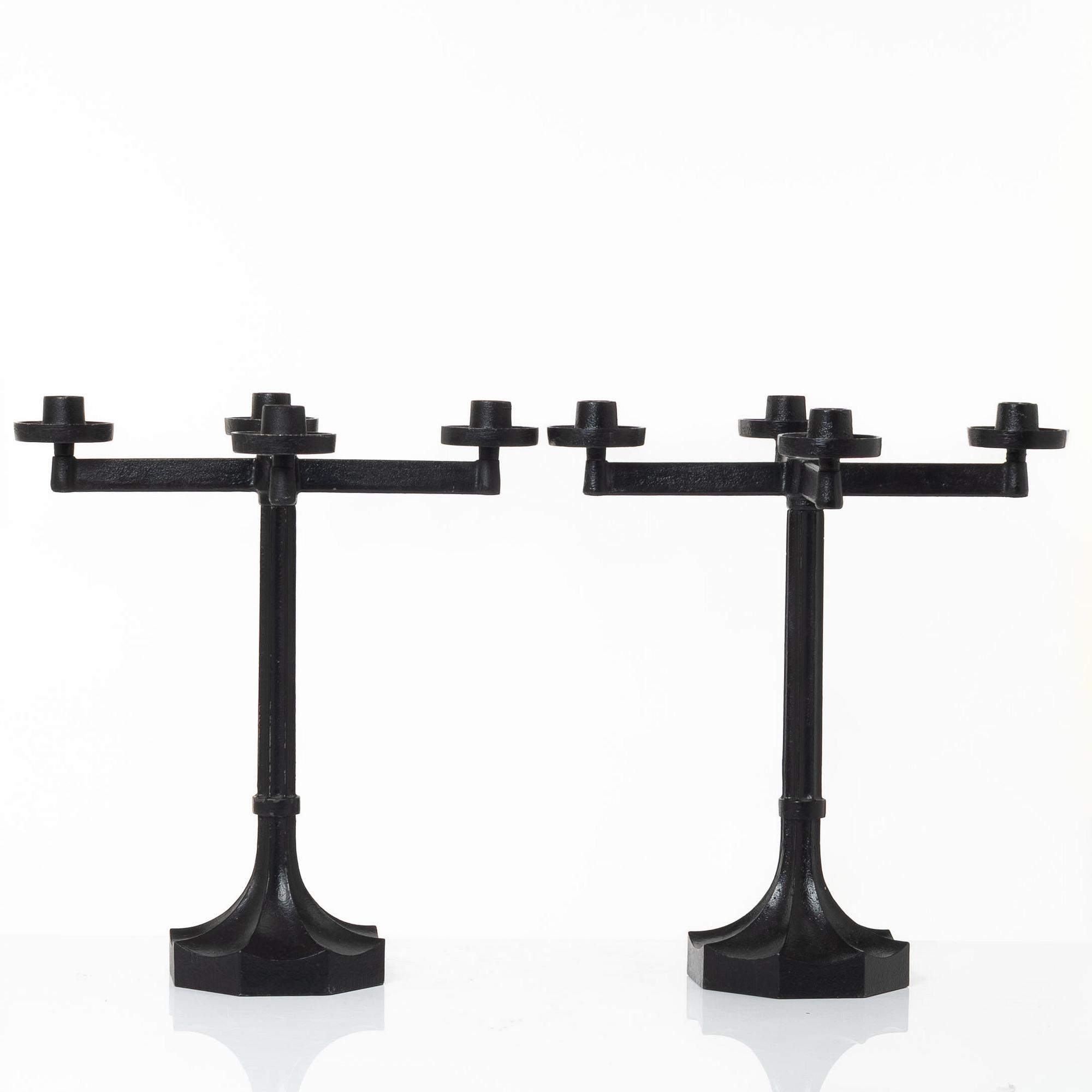 Sigurd Persson, a pair ofa cast iron candelabras, Kockums 1965.