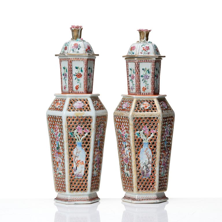 A pair of famille rose vases with covers, Qing dynasty, Qianlong (1736-95).