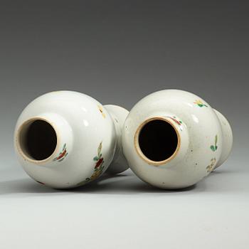 A pair of famille rose vases, Qing dynasty, Qianlong (1735-95).