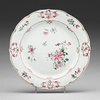 A set of 12 famille rose dinner plates, Qing dynasty, Qianlong (1736-95).