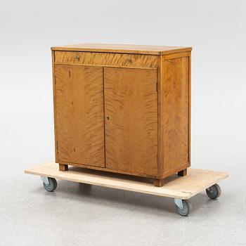 Axel Larsson, attributed, a stained birch cabinet, probably by Svenska Möbelfabrikerna Bodafors, 1930's/40's.