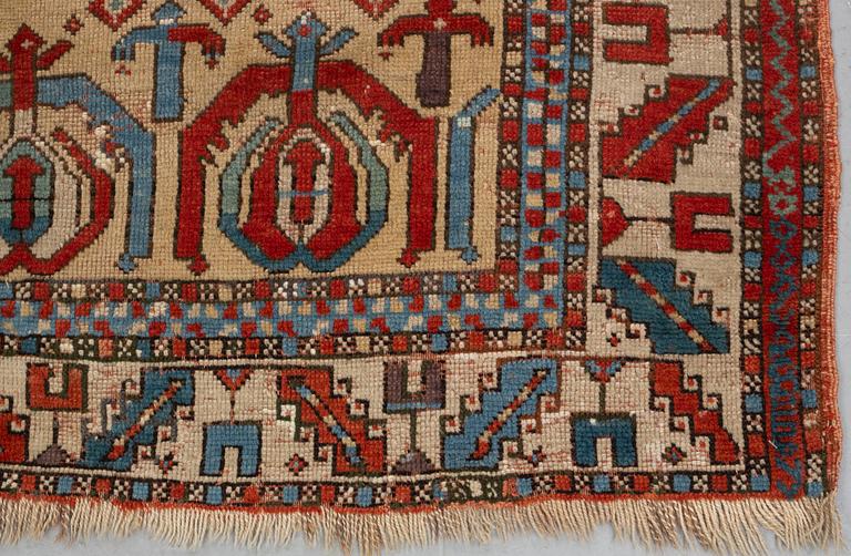 A rug, antique Anatolian/Caucasian, ca 148-149 x 104,5-110 cm (as well as 1-1,5 cm flat weave at one end).