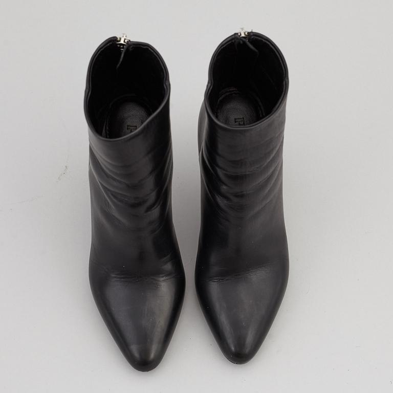 PRADA, a pair of black leather boots, size 35.