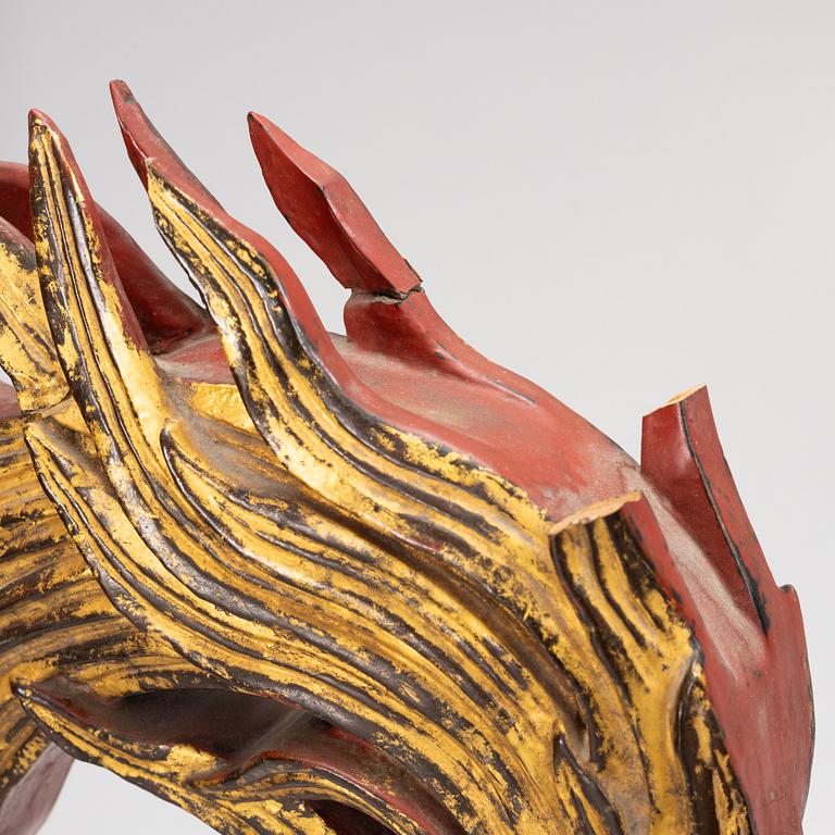 A pair of large Qilin sculptures, lacquered wood, first part of the 20th century.